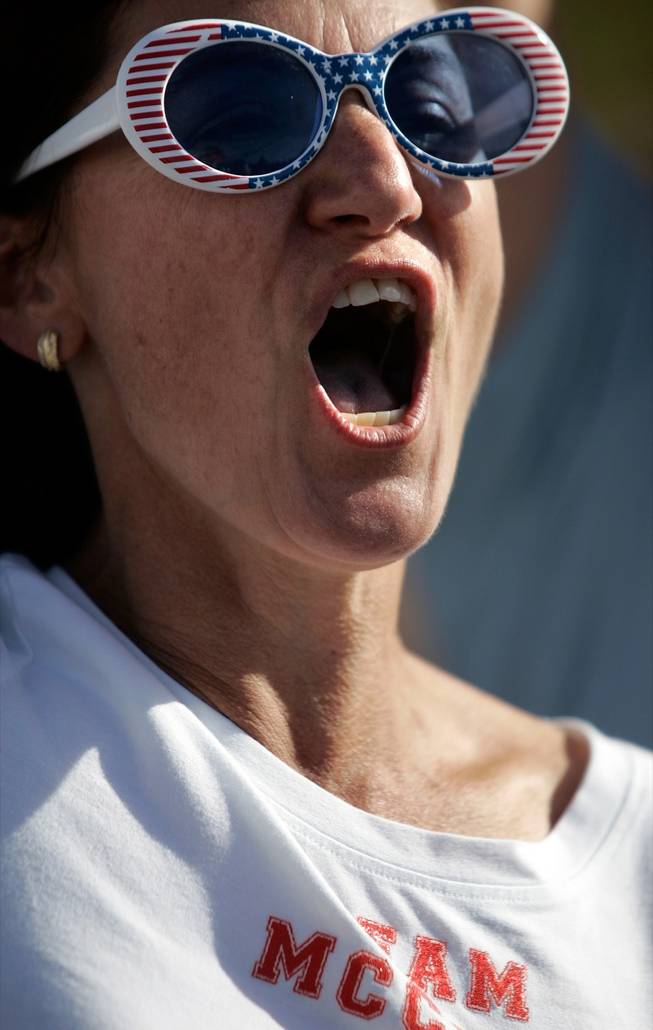 Renne Tanner, a John McCain volunteer from Salt Lake City, chants toward Barack Obama supporters demonstrating outside the Sarah Palin rally at the Henderson Pavilion in Henderson Tuesday.