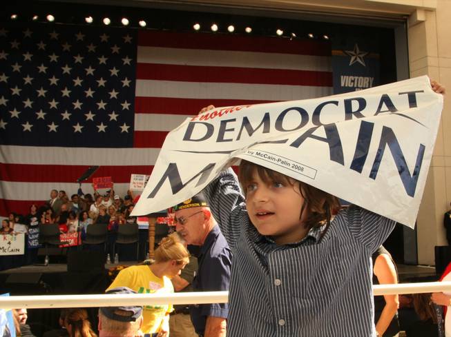 Matthew Mandel, 6, waits for Republican vice presidential nominee and Alaska Gov. Sarah Palin at a rally Tuesday, Oct. 21, 2008, in Henderson, Nev., . 
