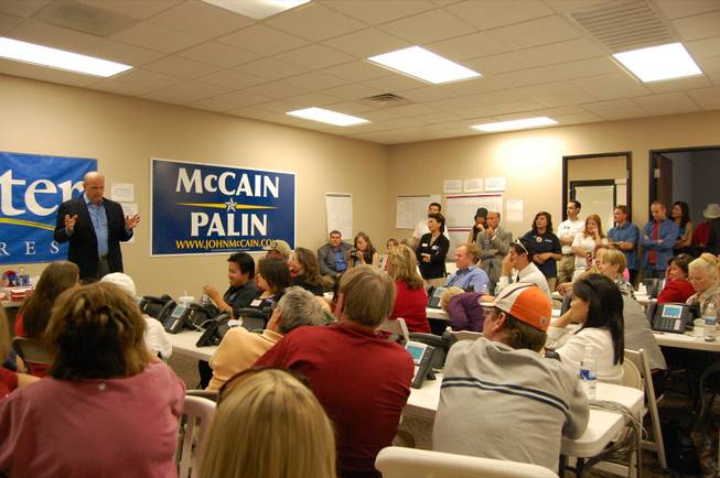 Tennessee senator Fred Thompson (R) addresses a room of volunteers and supporters at the McCain-Palin headquarters in Henderson Tuesday afternoon. 