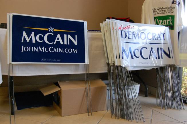 McCain-Palin yard signs sit in the entrance of the McCain-Palin headquarters in Henderson.