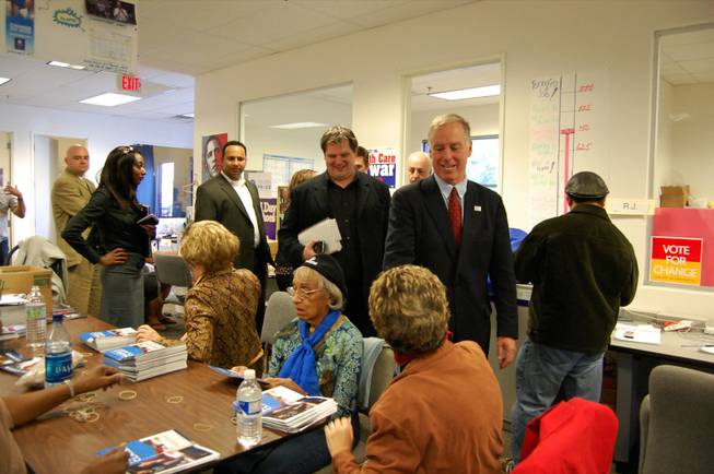 Democratic National Committee Chairman Howard Dean greets volunteers at the Las Vegas Obama-Biden headquarters Thursday morning. 