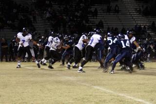Desert Pines attempts to gain yards during Thursday's game at Canyon Springs.