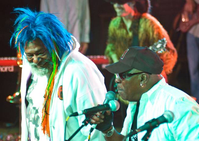 Sidney Barnes, right, performs alongside George Clinton Oct. 10 at the Loki Music festival at Mill River, N.C. Barnes met Clinton in the 1950s and helped launch his career with Motown Records.