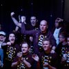 Friends and family of Peter Eastgate cheer for the 22-year-old from Denmark during the main event of the World Series of Poker's final table live from the Penn & Teller Theater at the Rio in Las Vegas, on Sunday night, Nov. 9, 2008.