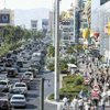 Visitors jam the Las Vegas Strip in this file photo.