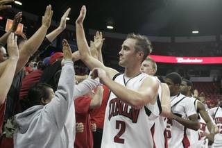 UNLV's Kendall Wallace thanks fans after beating Northern Arizona 87-71 on Thursday. Wallace finished with 14 points and UNLV improved to 3-0.