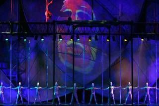 Chinese Pole artists perform during Cirque du Soleil's 