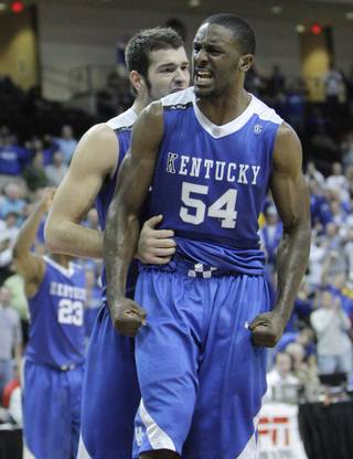 Kentucky's Patrick Patterson reacts after drawing a foul against West Virginia during the second half of the championship game of the Las Vegas Invitational. Patterson scored 15 points in Kentucky's 54-43 victory.