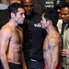 Boxers Oscar De La Hoya, left, and Manny Pacquiao of the Philippines face each other during an official weigh-in at the MGM Grand Garden Arena Friday, December 5, 2008. De La Hoya and Pacquiao will meet for a 12-round welterweight fight at the arena on Saturday.