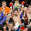 WBC lightweight champion Manny Pacquiao celebrates his victory over Oscar De La Hoya shortly after their welterweight boxing match in Las Vegas on Saturday, Dec. 6, 2008. Pacquiao won by TKO after the end of the eighth round.