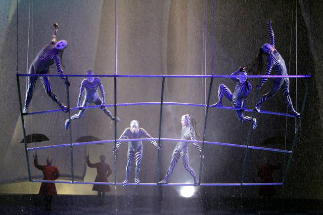 Artists perform in the Cadre Act during Cirque du Soleil's ...