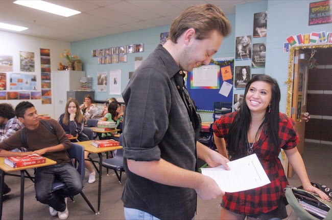 From left to right, members of the Coronado Humane Society Club, Ryan Hulsey, president, and Nikki Wogalter, co-treasurer, have a small discussion at the beginning of their meeting.