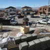 While prices of new homes held steady in the Las Vegas area last month, existing homes saw another steep drop in their median sales price in November -- down to levels not seen since summer 2003. 