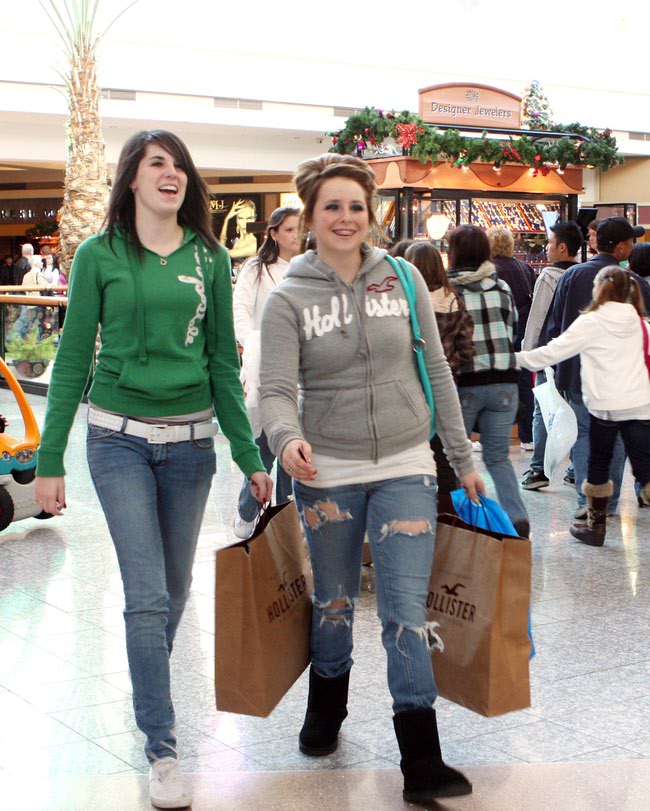 Kristen Pullium, left, and Amber Marlett take advantage of after Christmas sales inside the Galleria Mall on December 26, 2008.
