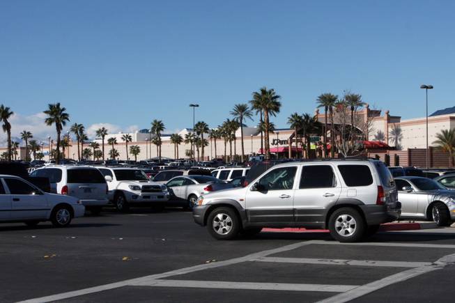 The parking lot surrounding the Galleria Mall at Sunset is filled with shoppers and those returning merchandise on the day after Christmas on Dec. 26, 2008.
