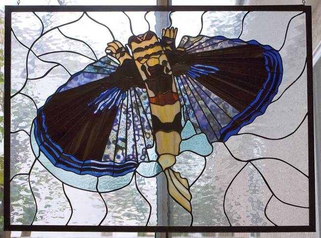 "Flying Gurnard," a stained glass piece by Christine Curtis Wilson, will be exhibited at the Summerlin Library.