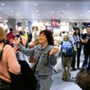 Teresa Ninman, center, of Las Vegas greets her friend LaNor Maltby, who flew in from Milwaukee, in November at McCarran International Airport. Capacity at the airport fell about 15 percent in 2008, but some airlines are adding flights -- and other things may be looking up for the local economy.