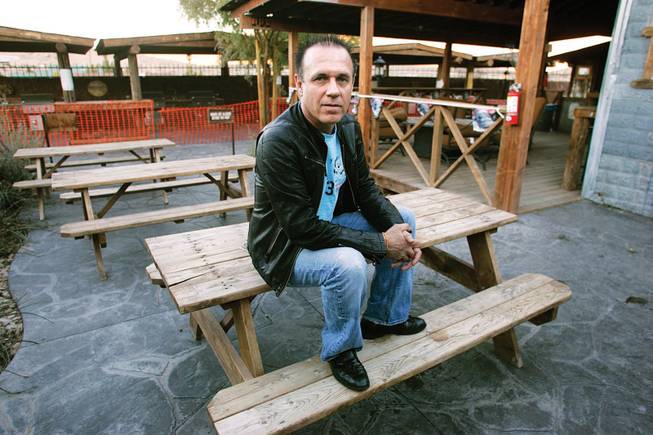 Noel Sheckells, owner of the Pioneer, sits in the patio area that was closed because of zoning issues. Clark County commissioners denied his appeal Tuesday, and he withdrew his proposal to add a 13-room hotel.