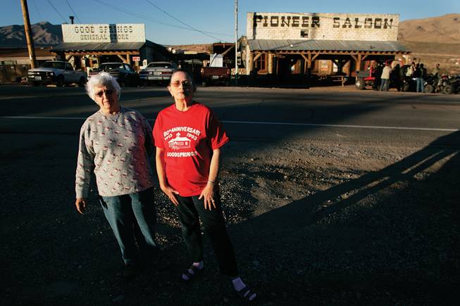 
Goodsprings residents Liz Warren, left, and Ruth Rawlinson stand across from the historic Pioneer Saloon, whose expansion they oppose, they say, for fear of the kind of clientele a hotel might attract. "We are plagued with revving motors through town all hours of the day and night," Rawlinson said.