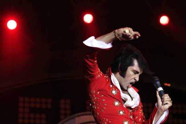 Eli Williams performs during the second annual Las Vegas Ultimate Elvis Tribute Artist Contest Saturday, May 7, 2011 at the Fremont Street Experience.
