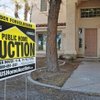 Thousands of homes in the Las Vegas Valley are in foreclosure, as was this one in Henderson, and growth has slowed considerably. The median price of homes in the region has plummeted $100,000 in 18 months. 