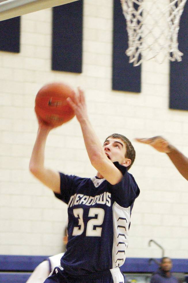 Meadows guard Austin Brown goes for the shot during a basketball game at Agassi Prep on Jan.6.
