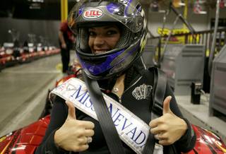 2009 Miss Nevada Julianna Erdesz gets ready for the first race of the night at Pole Position Raceway in Las Vegas on Sunday as all 52 contestants of the Miss America Pageant raced.