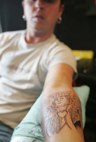 Justin Carder gets a tattoo depicting a king of hearts by tattoo artist Mauricio Martinez, not shown, during the Art and Ink Tattoo Festival at the South Point Casino and Hotel Friday.
