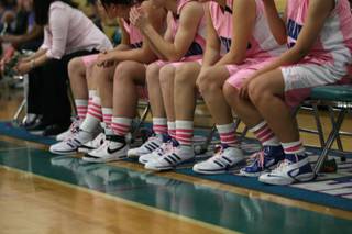 The Silverado girls' basketball team sported pink uniforms and socks during its division battle with Green Valley for 
