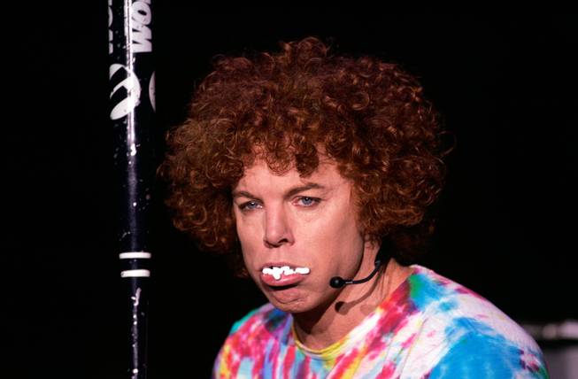 Carrot Top does an impersonation of baseball player Barry Bonds during his performance at the Atrium Theatre inside the Luxor Thursday, Jan. 29, 2009.  