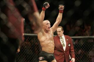 Georges St. Pierre reacts after defeating B.J. Penn by TKO at UFC 94 on Saturday, January 31, 2009 at the MGM Grand Garden Arena.