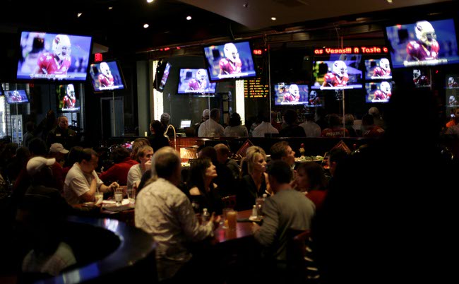 Super Bowl fans gather at ESPN Zone on the Las Vegas Strip to watch the game Sunday as the Arizona Cardinals took on the Pittsburgh Steelers. Seating was limited to about 450 people. 