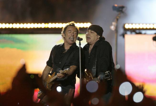 Bruce Springsteen, left, and Steven Van Zandt, of Bruce Springsteen and the E Street Band, perform at halftime at the NFL Super Bowl XLIII football game between the Arizona Cardinals and Pittsburgh Steelers, Sunday, Feb. 1, 2009, in Tampa, Fla.
