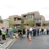 Attendees of the National Association of Homebuilders convention wait to get a look at the New American Home 2009, expected to sell for more than $4 million.