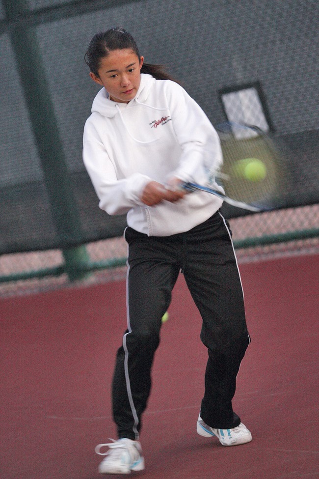 Kimberly Yee, 12, won the USTA National Winter Championships sportsmanship award in December. She is shown practicing at the Las Vegas Hilton.