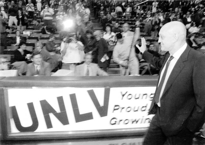 Former UNLV Men's Basketball coach Jerry Tarkanian enters the court ...