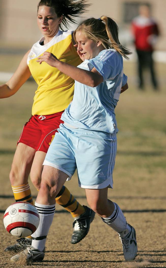From left to right, Southeast Career and Technical Academy's Maci Fix and Foothill's Kim Callen fight for control of the ball during a game on Feb. 3. A freshman, Callen plays midfield for Foothill, while playing goalie for her club team.  
