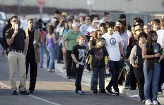 People wait in line Thursday, February 18, 2010 to get tickets to the President Barack Obama's Friday town hall meeting at Green Valley High School in Henderson.