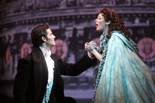 On the rooftop, Andrew Ragone as Raoul and Kristi Holden as Christine during 