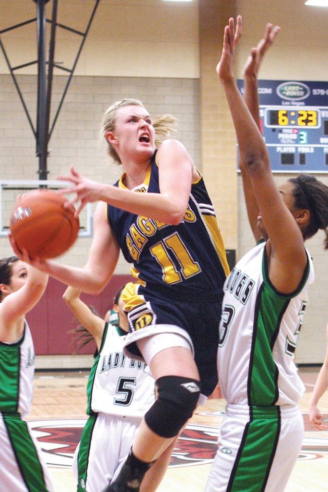 Boulder City forward Caiti Forrester leaps for the basket during the girls 3A regional championship against Virgin Valley at Desert Oasis High School on Saturday.
