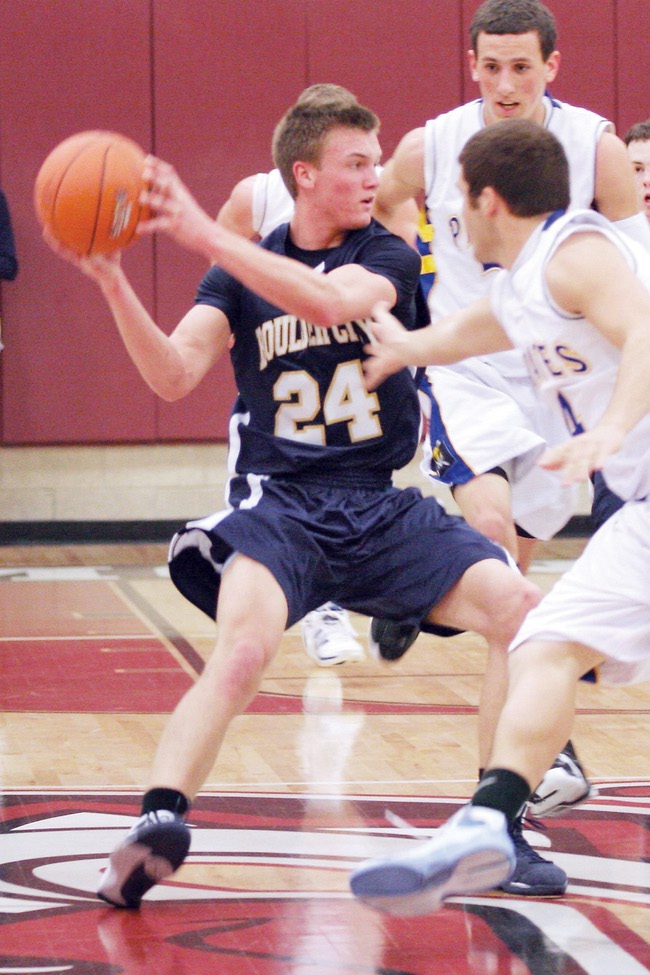 Boulder City center Shane Levin finds an open player during the boys 3A Southern Regional Championship game against Moapa Valley at Desert Oasis High School on Saturday.
