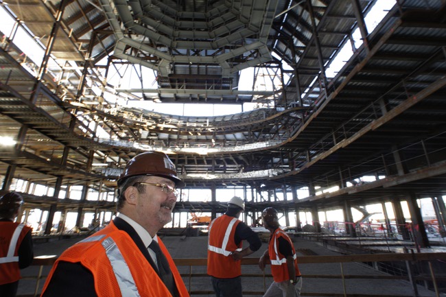 Myron Martin, left, Smith Center president and CEO, stands on center stage after a topping-off ceremony for the Smith Center for the Performing Arts in downtown Las Vegas on Thursday, Feb. 25, 2010.