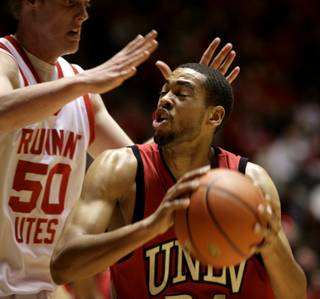 Rene Rougeau goes up against the much taller Luke Nevill of Utah as UNLV takes on Utah Wednesday night at the Huntsman Center in Salt Lake City.   Utah defeated UNLV 70-60, making the series even on the season.