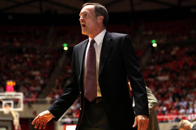 UNLV head coach Lon Kruger argues a call as UNLV takes on Utah Wednesday night at the Huntsman Center in Salt Lake City. Utah defeated UNLV 70-60 making the series even on the season.