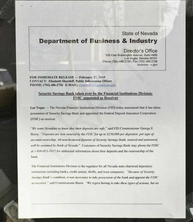 A notice posted on the door of Security Savings Bank, which was taken over by the Nevada Financial Institutions Division on Friday. The Federal Deposit Insurance Corp. is the receiver.