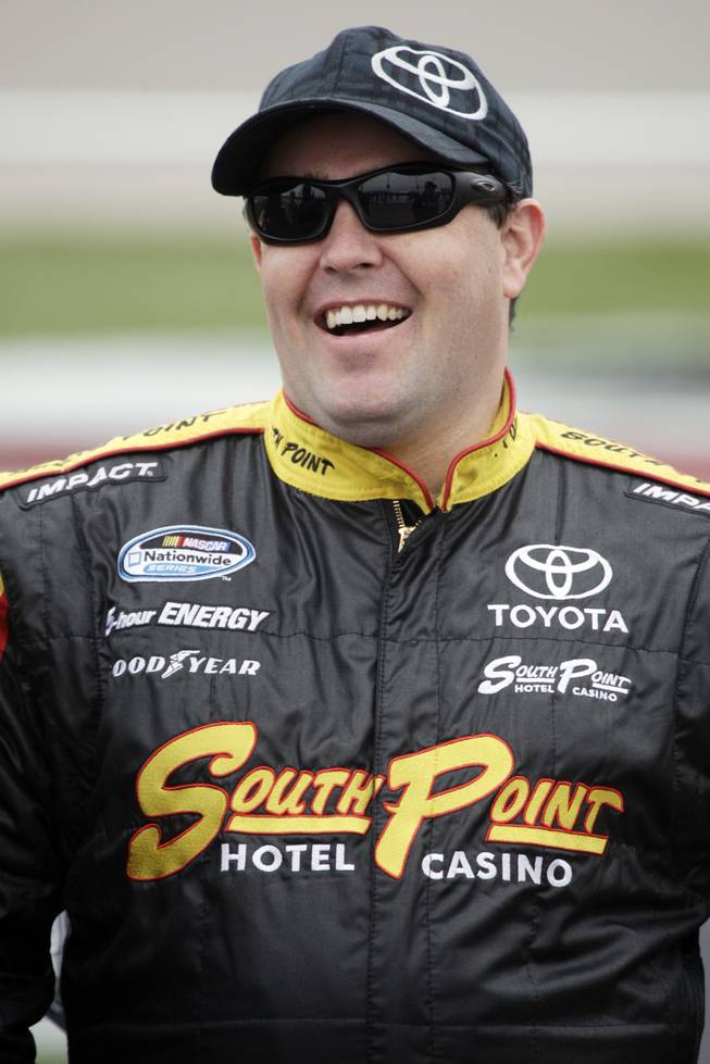 Las Vegan Brendan Gaughan smiles before a qualifying run for the NASCAR Nationwide Series Sam's Town 300 auto race at the Las Vegas Motor Speedway on Saturday, Feb. 27, 2010.