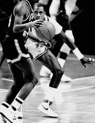 Runnin' Rebels Freddie Banks stares down a player on defense. Banks is one of four Runnin' Rebels to score over 2,000 points in a career. 