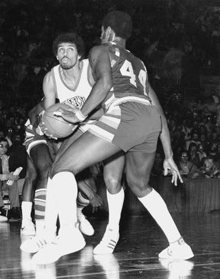 UNLV's Reggie Theus tries to drive to the basket for the Rebels. 