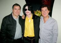 Kenny Ortega, Michael Jackson and Simon Fuller.