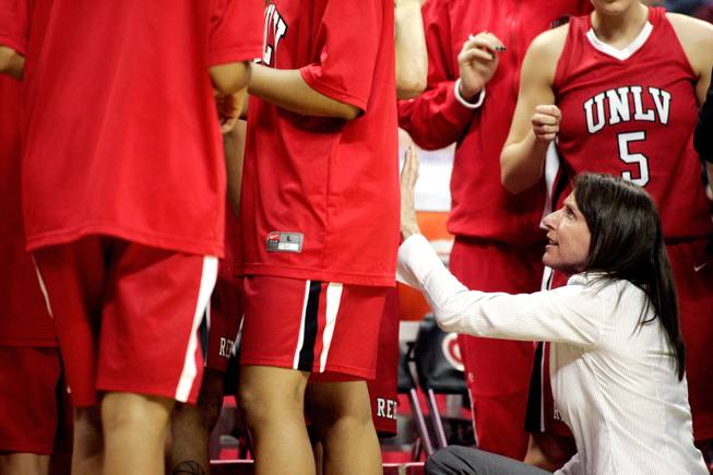 UNLV head coach Kathy Olivier talks to the team during a timeout against BYU during the first round of the Mountain West Championship at the Thomas & Mack Center in Las Vegas on Tuesday. UNLV won the game 66-58.